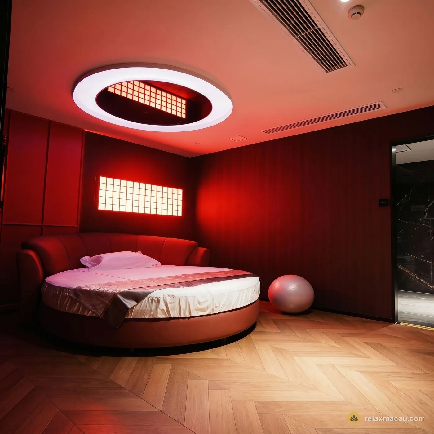 Number Nine Spa red round-bed room
