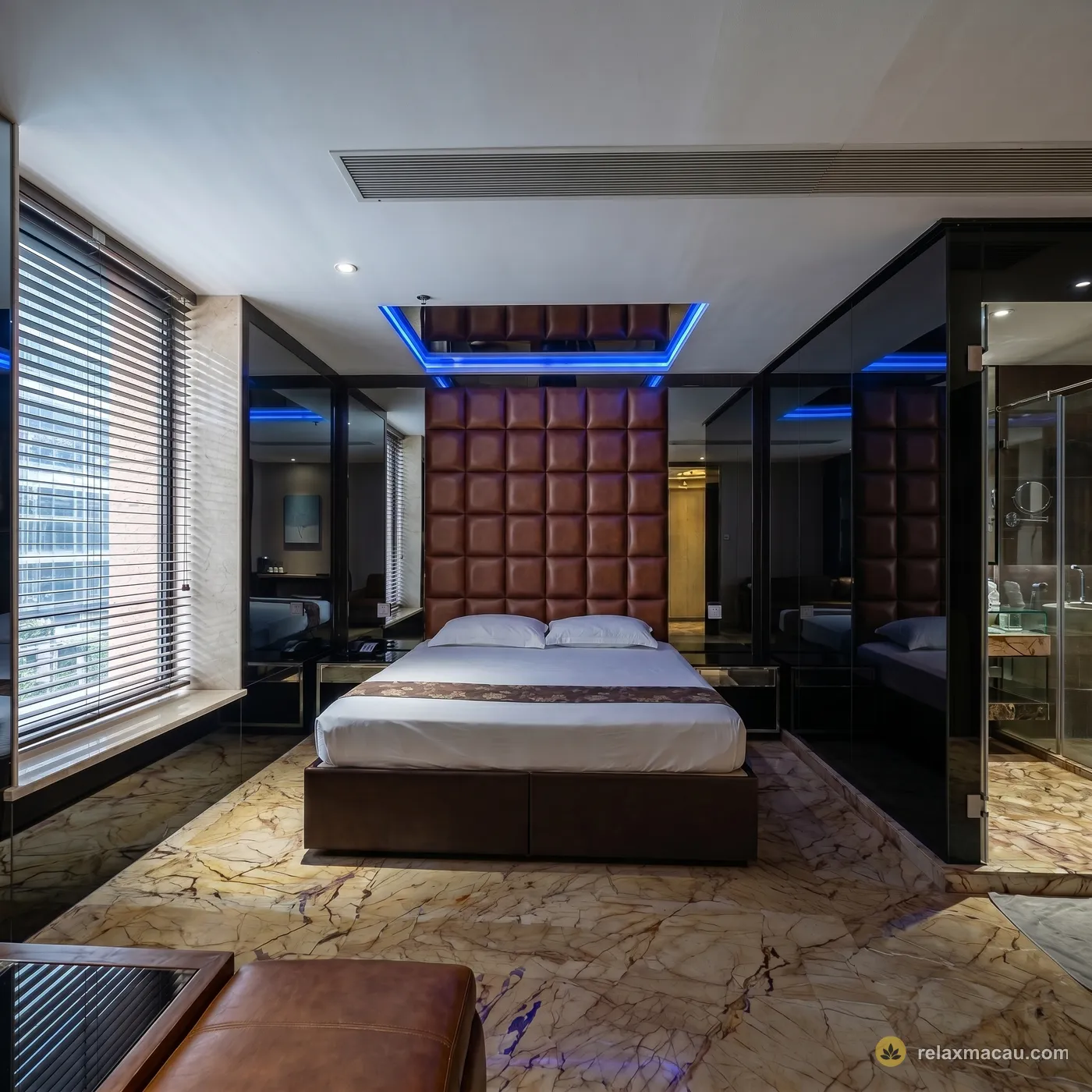 The Excellent Sauna leather-headboard suite