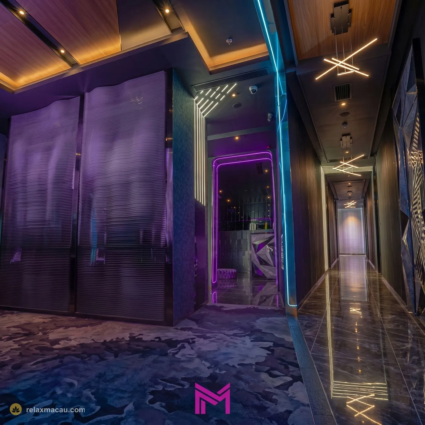 M Club neon mirror corridor